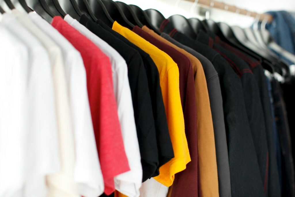 closeup of hanged shirts on rack, zero-waste, sustainable living